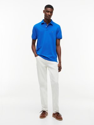 Unifarbenes Poloshirt 1985 und kleiner Flag-Stickerei, Regular Fit