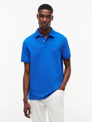 Unifarbenes Poloshirt 1985 und kleiner Flag-Stickerei, Regular Fit