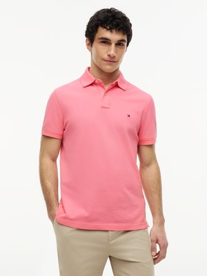Unifarbenes Poloshirt 1985 und kleiner Flag-Stickerei, Regular Fit