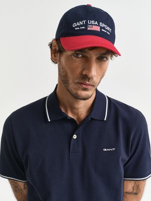 Piqué-Poloshirt aus Baumwolle mit Kontraststreifen, Regular Fit