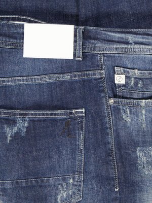Jeans in Used-Optik mit Distressed-Details, Tapered Fit